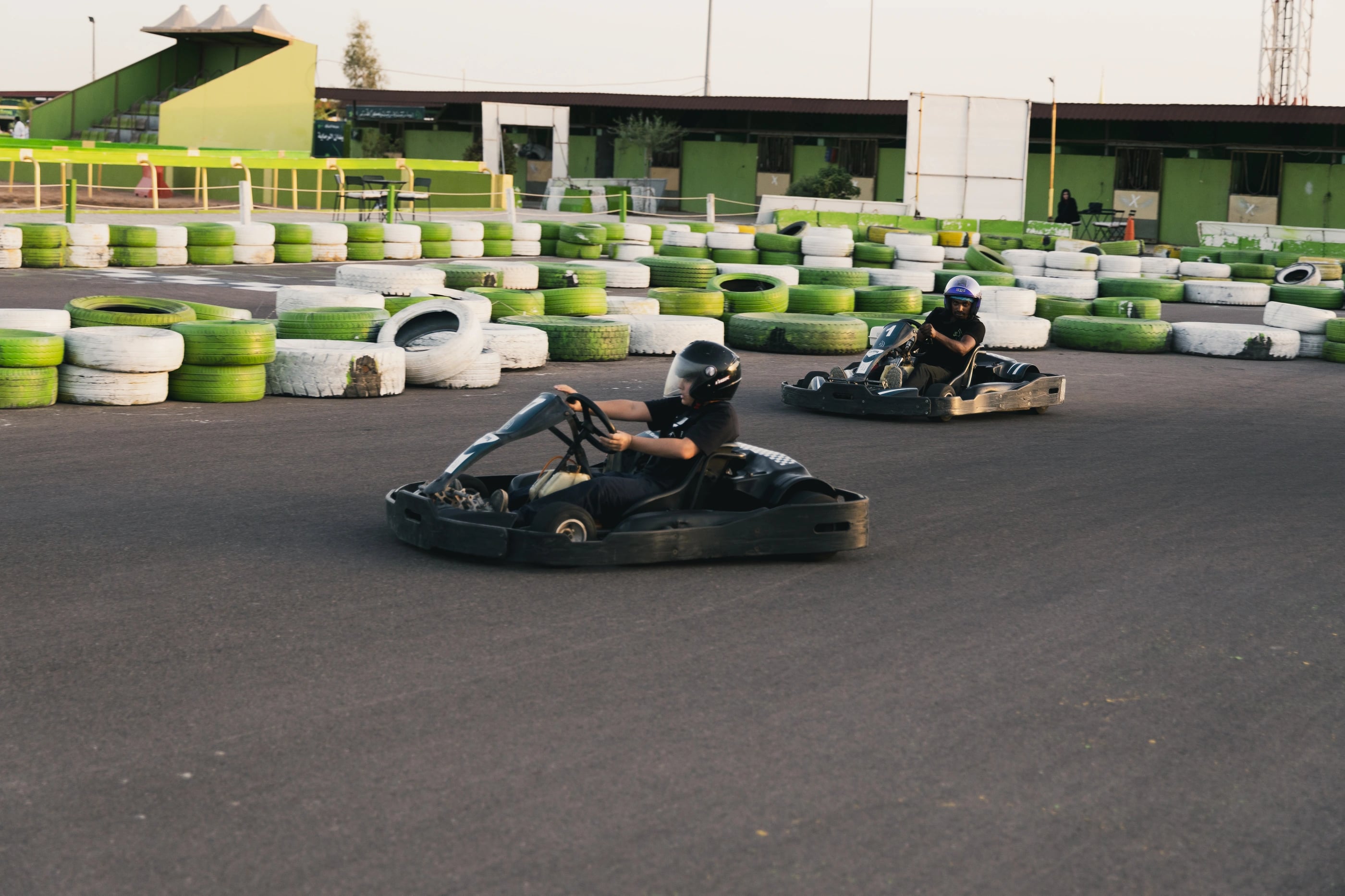 Karts racing around the track